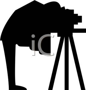 Clipart Image Of A Silhouette Of A Man With An Old Fashioned Camera
