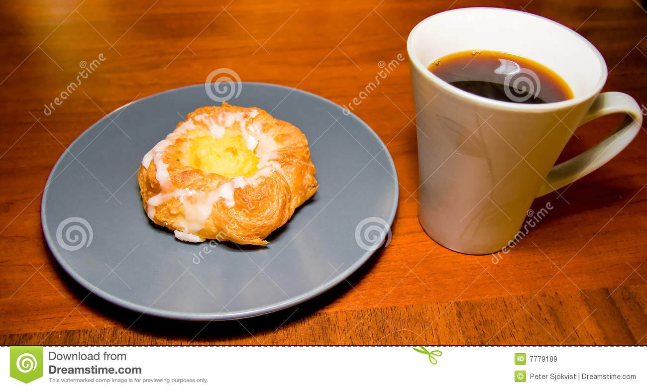 Danish Pastry On Gray Blue Plate With Cup Of Hot Black Coffee On A    