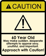 Sign Text Says Caution  60 Year Old  May Make Sudden Desperate