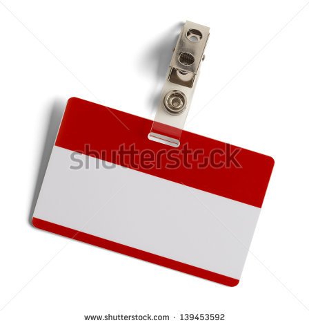 Red And White Plastic Name Badge With Metal Clip Isolated On White