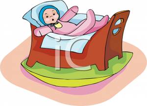 Baby Doll Laying In A Doll Bed   Royalty Free Clipart Picture