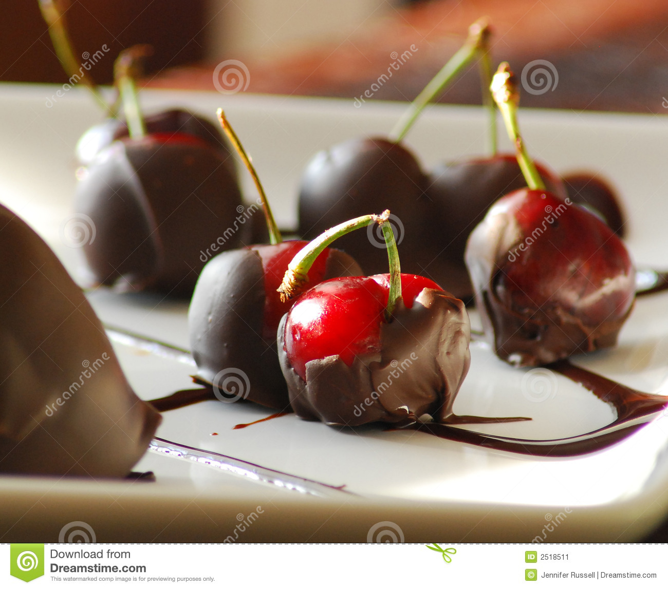 An Artistic Plate Of Chocolate Covered Cherries  The Cherries Have A    