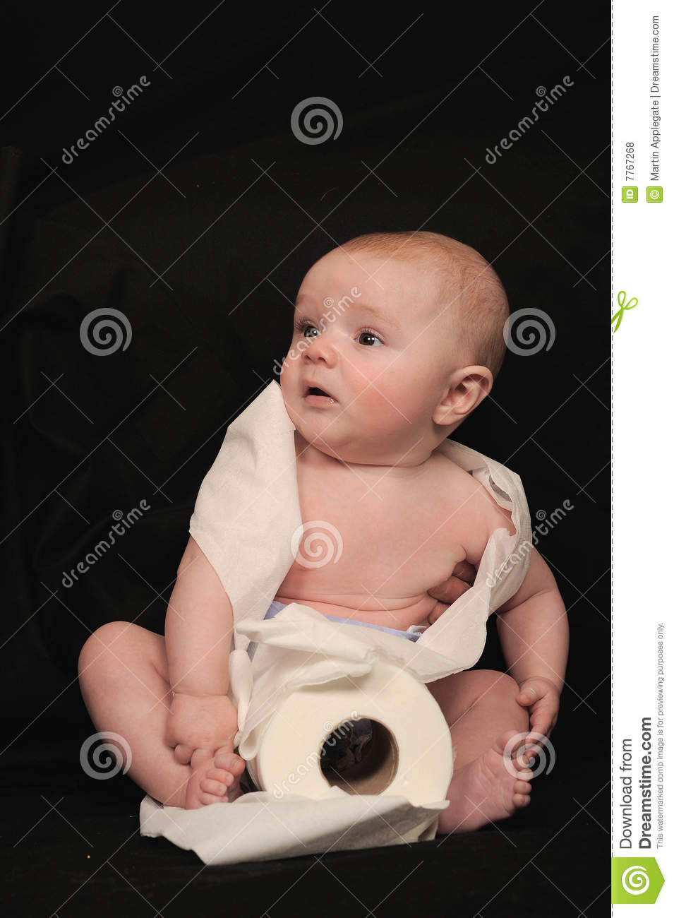     Baby Sitting On The Floor Playing With A Roll Of Toilet Paper  Black