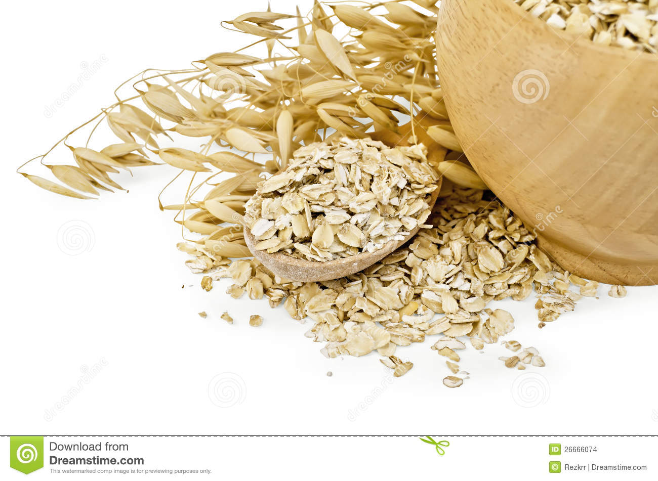 Oat Flakes In A Wooden Bowl And Spoon Stalks Of Oats With A Light
