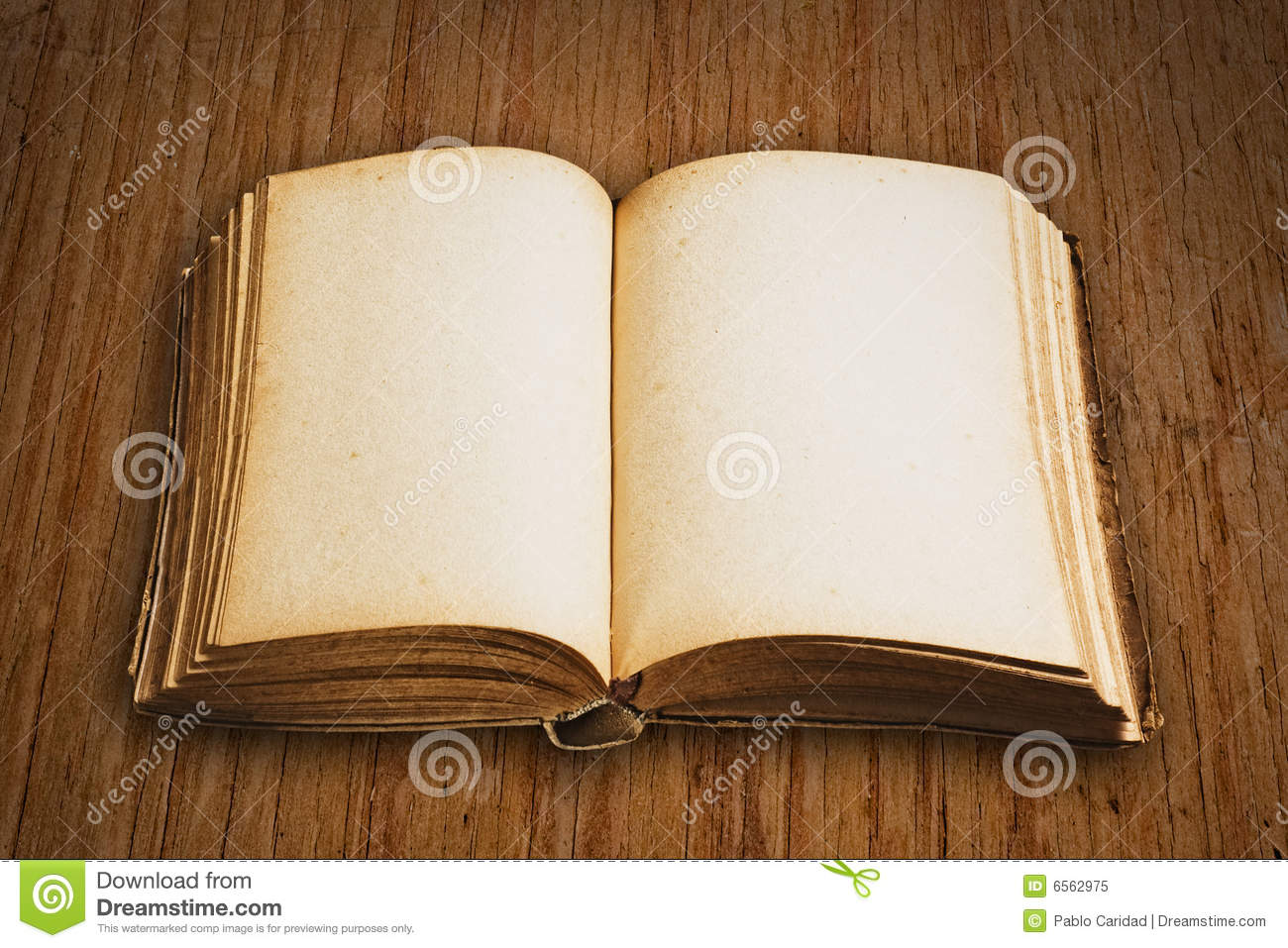 Pages Of Vintage Book On Wooden Surface With Clipping Path And Copy    