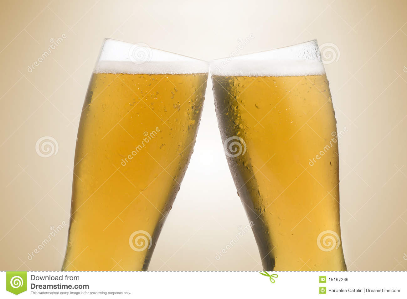 Pair Of Beer Glasses Making A Toast  Beer Splash