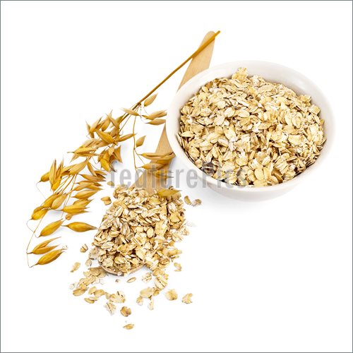 Rolled Oats In A Wooden Spoon And A White Porcelain Bowl Oat Stalks