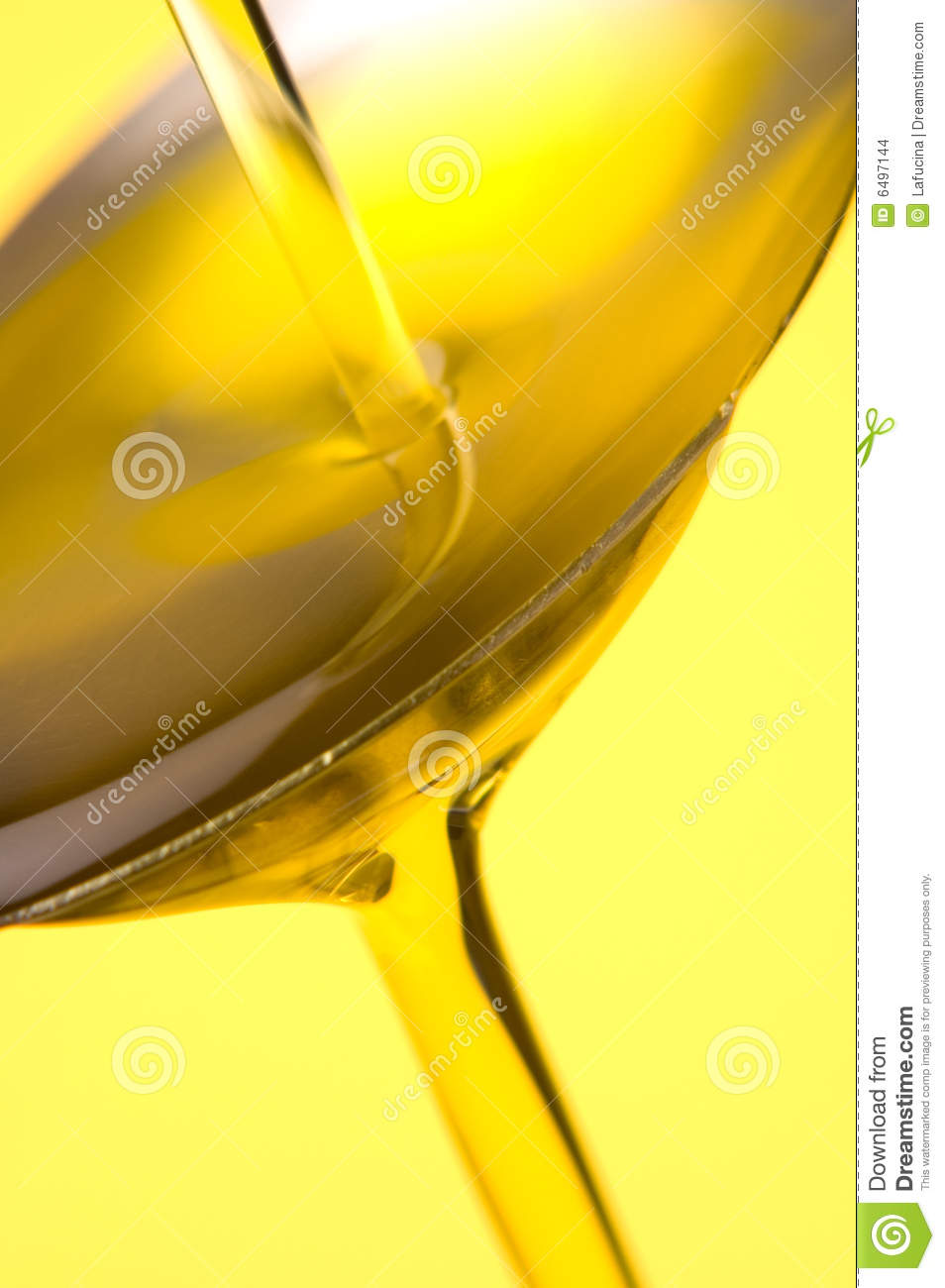 An Olive Oil Waterfall On Yellow Backgrounds