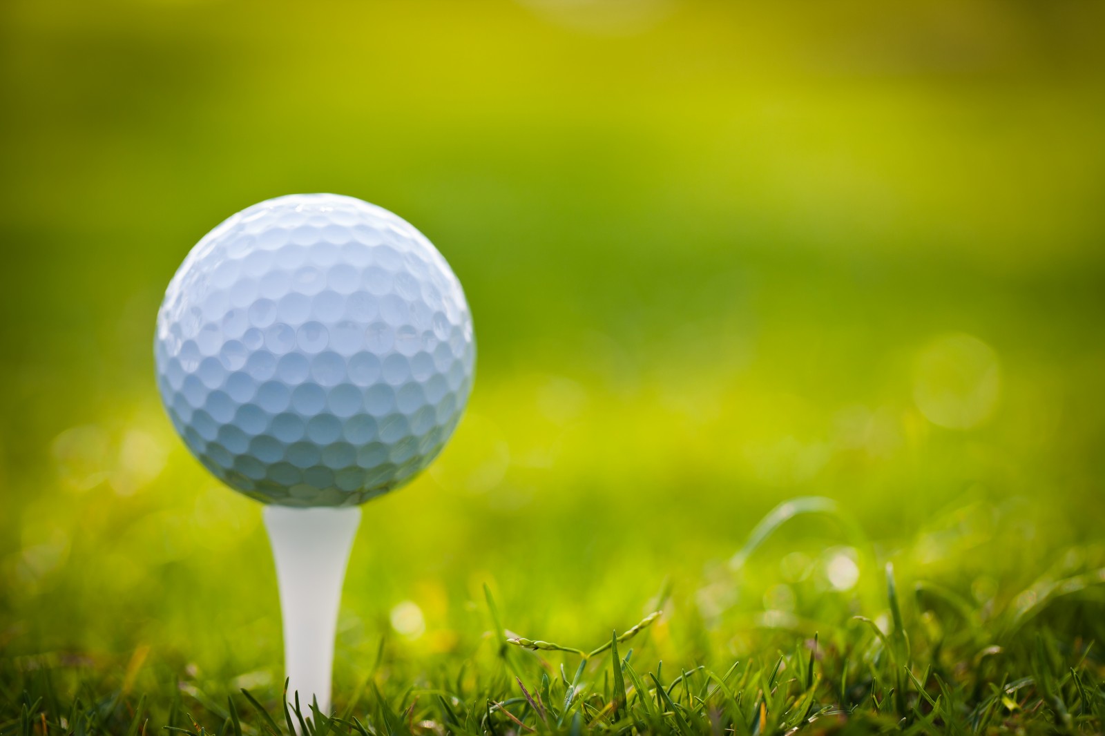 Golf Balls On Tee For Sport Fans