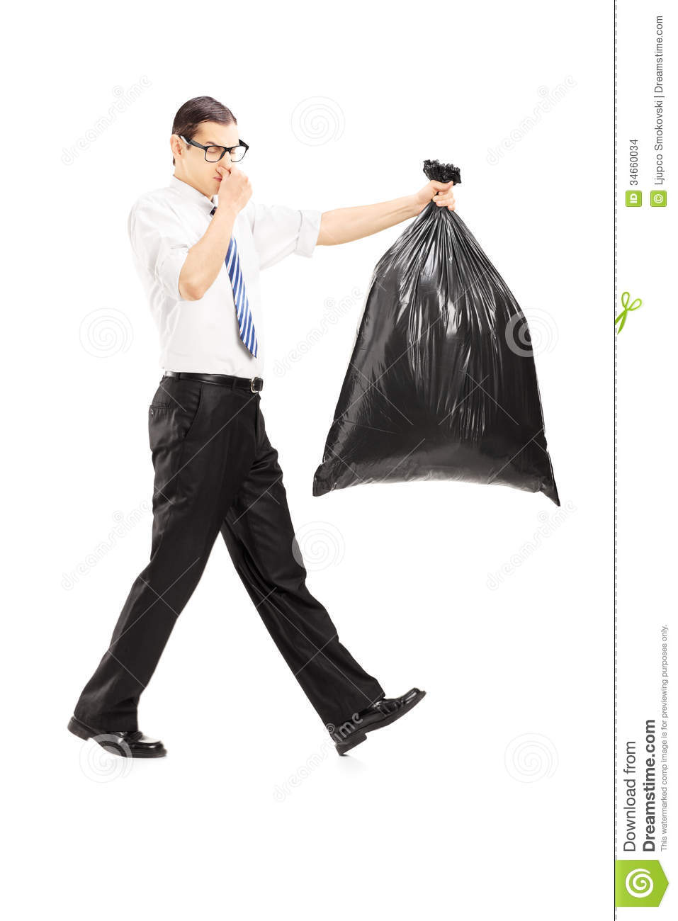 Male Closing His Nose And Carrying A Stinky Garbage Bag Stock Images