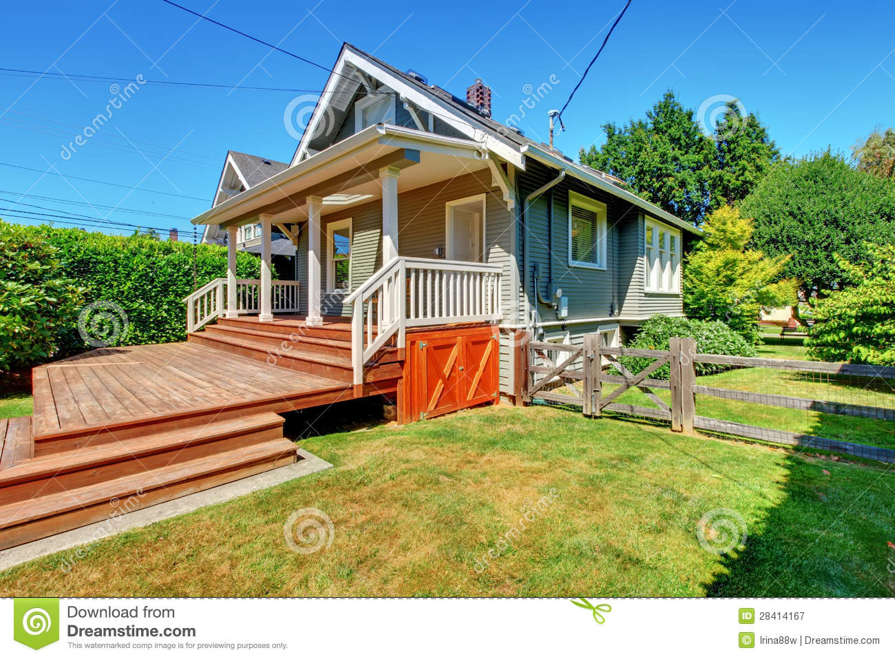 Small Grey House With Back Porch And Old Fence  Royalty Free Stock    