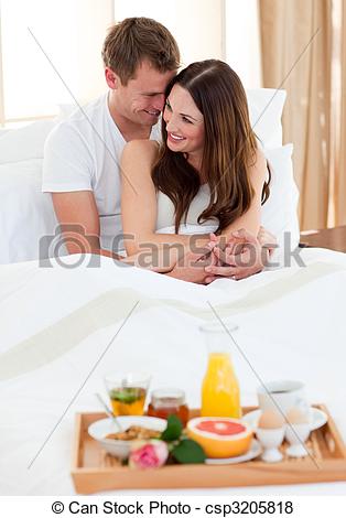 Stock Photo   Intimate Couple Having Breakfast Lying In Bed   Stock    