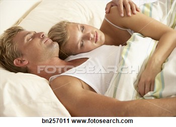 Stock Photography Of Sleeping Couple Cuddling In Bed Bn257011   Search