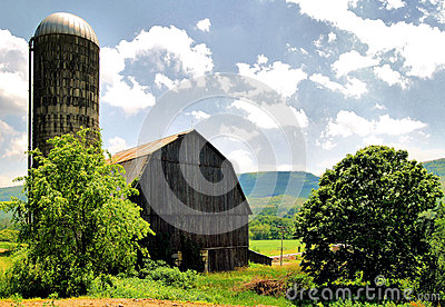Barn And Silo In The Amish Countryside Of Pennsylvania