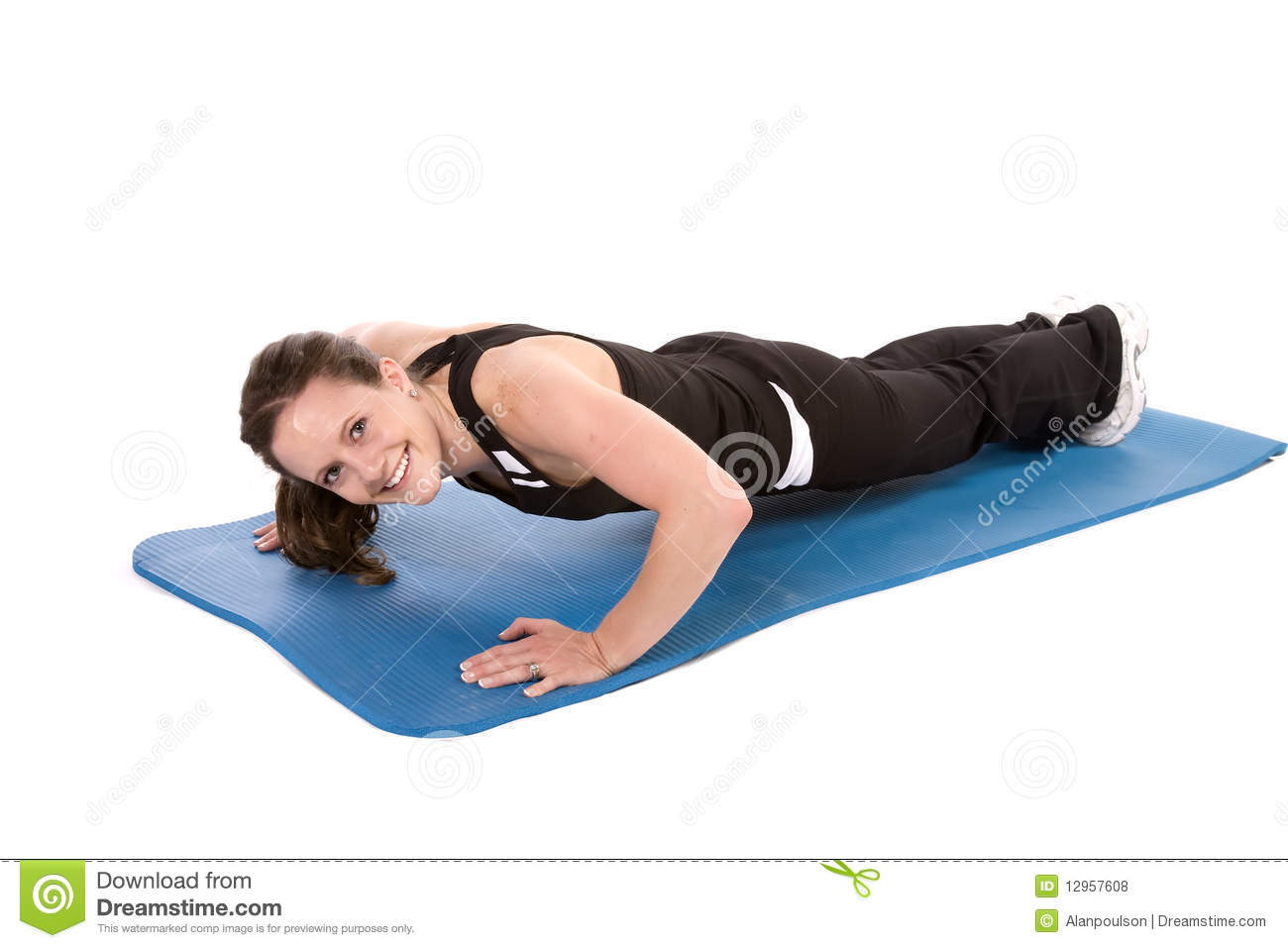 Woman Doing A Push Up Using Her Strength With A Smile On Her Face