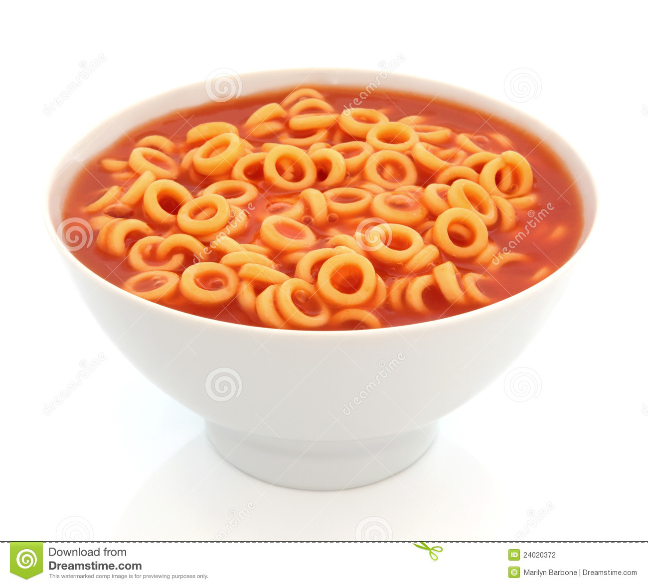 Spaghetti Pasta Hoops In Tomato Sauce In A Porcelain Bowl With Fork
