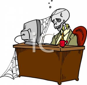 Skeleton Sitting At An Office Desk   Royalty Free Clipart Picture