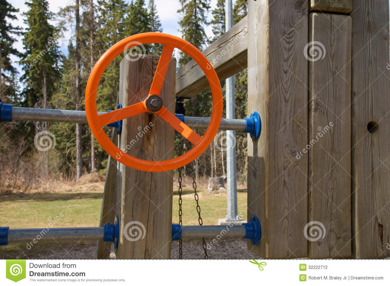Orange Playground Steering Wheel On A Wood Children S Equipment With A    