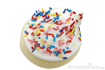 Top View Of A White Iced Cookie With Sprinkles  Isolated On White