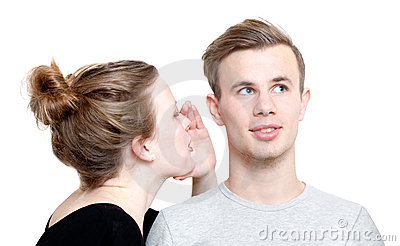 Girl Whispering To A Guy 