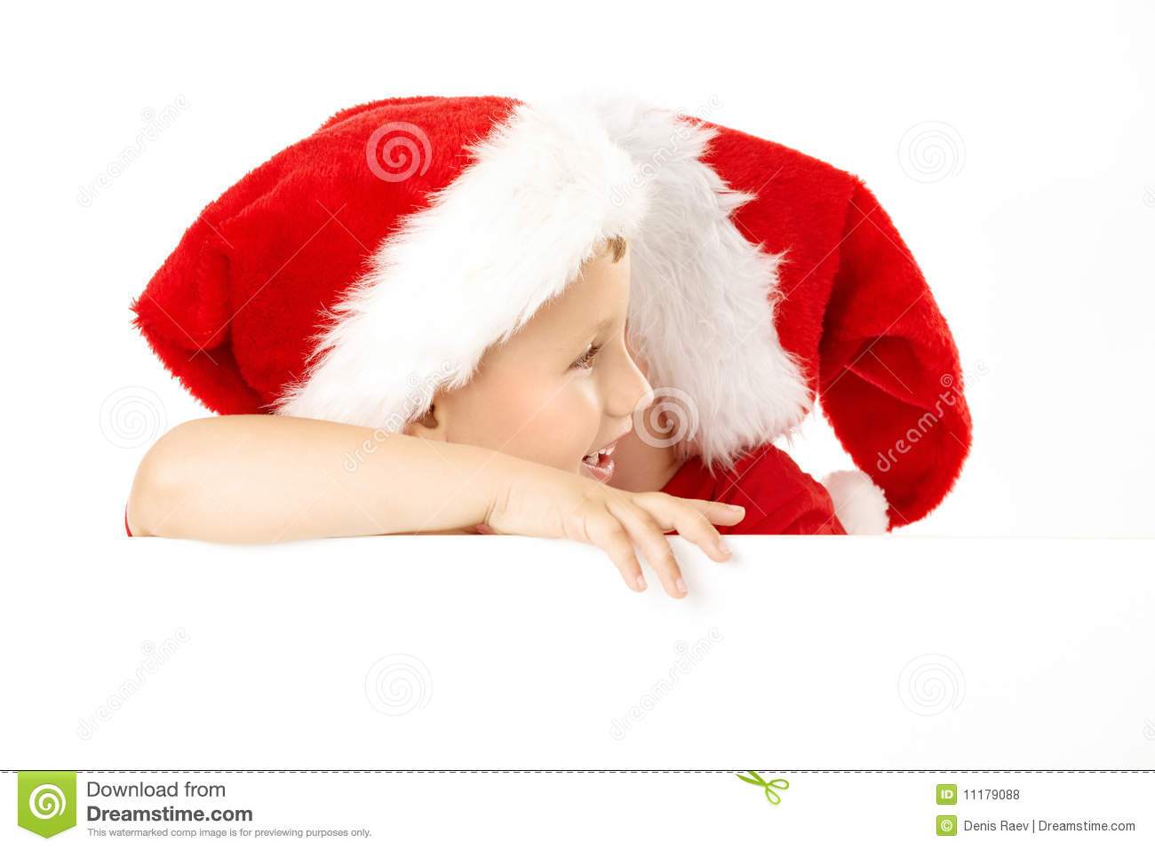 One Little Boy In A Cap Of Santa Whispers Another Something Over The    