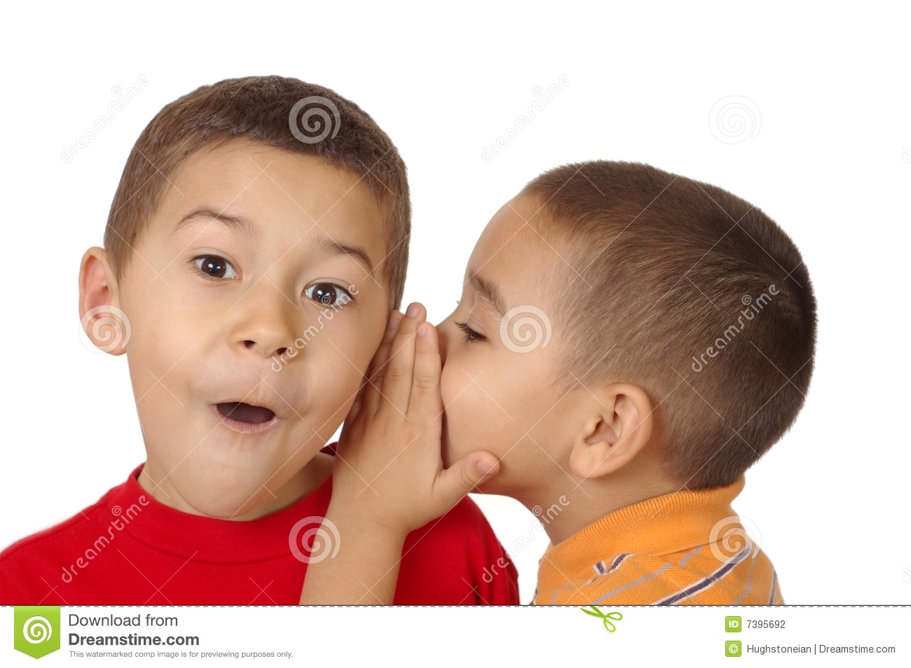Two Boys Aged Five And Six Years Share A Secret As One Whispers In    