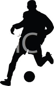 Silhouette Of An Athlete Playing Soccer   Royalty Free Clipart    