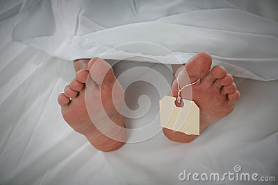 Morgue Showing The Feet Of A Dead Person