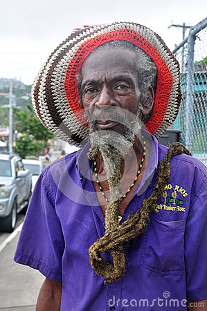 Rastafarian Man Face With Very Long Beard And Dreadlocks Wearing Rasta