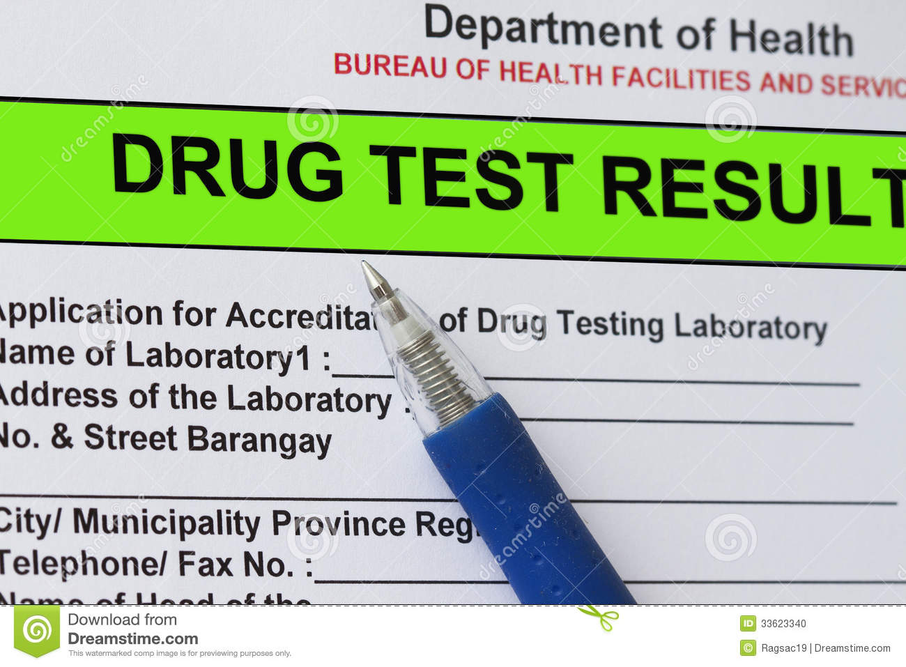 Macro Shot Of Drug Test Result Form With Blue Pen
