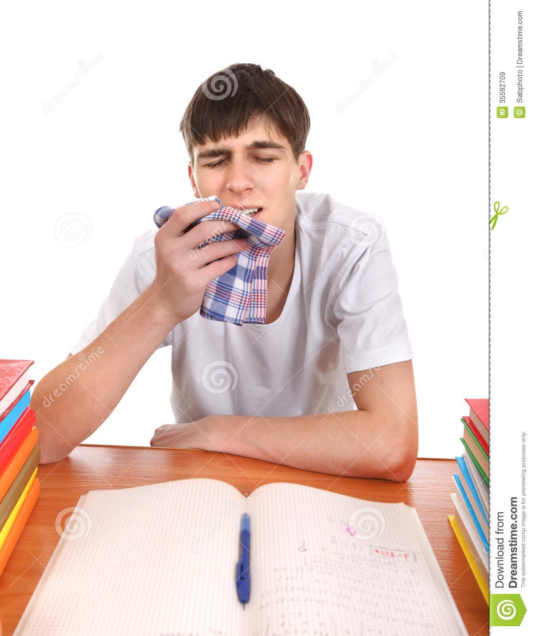 Sick Student At The School Desk Isolated On The White Background