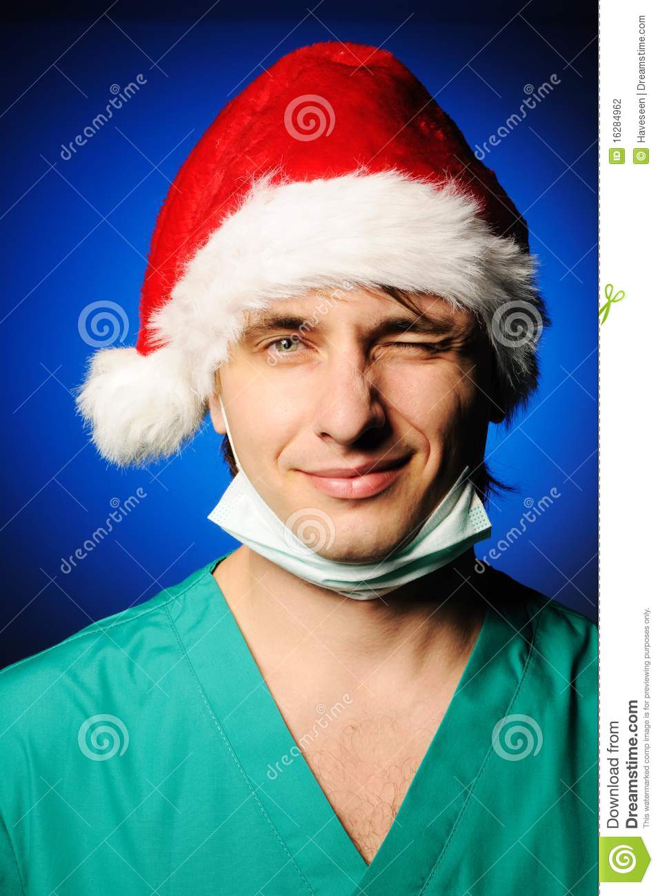 Surgeon With Mask In Santa S Hat Smiling And Winking 