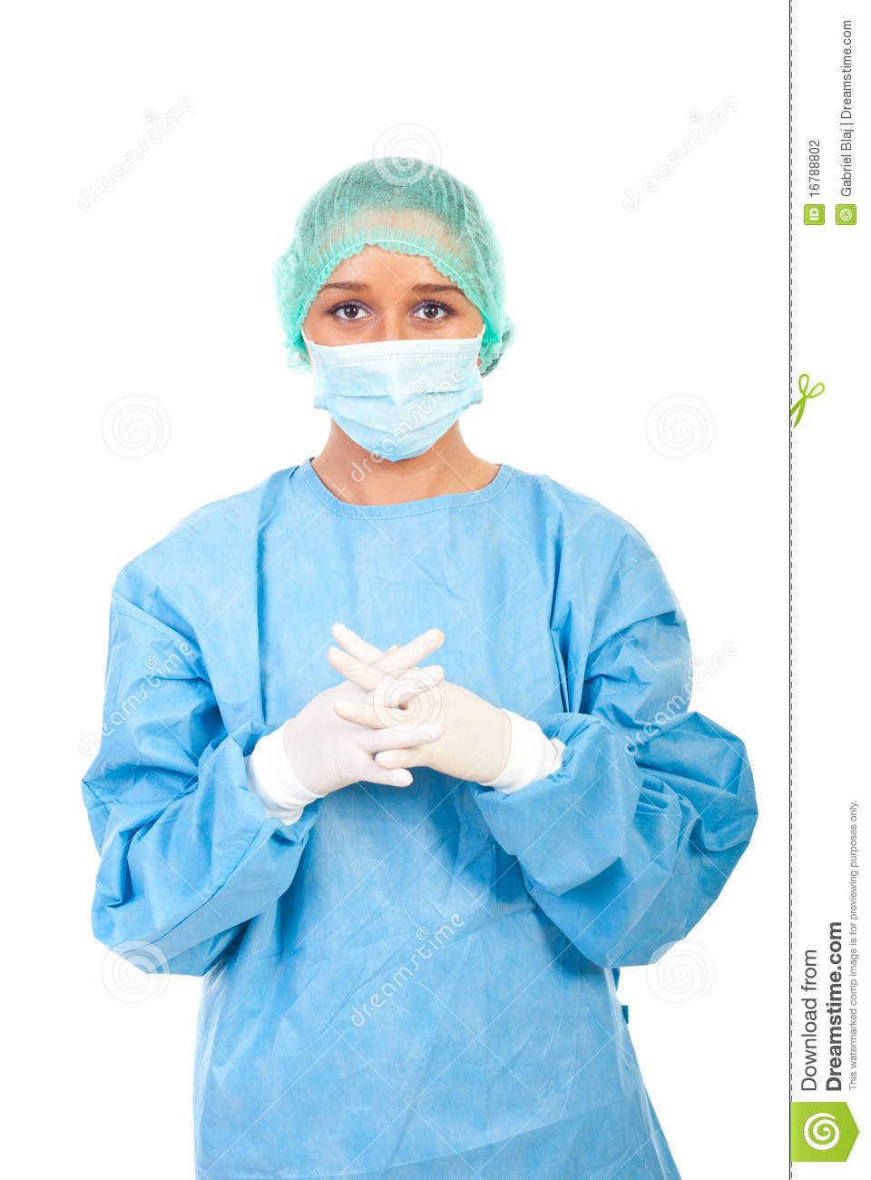 Surgeon Woman Dressed In Sterile Uniform Cap And Protective Gloves