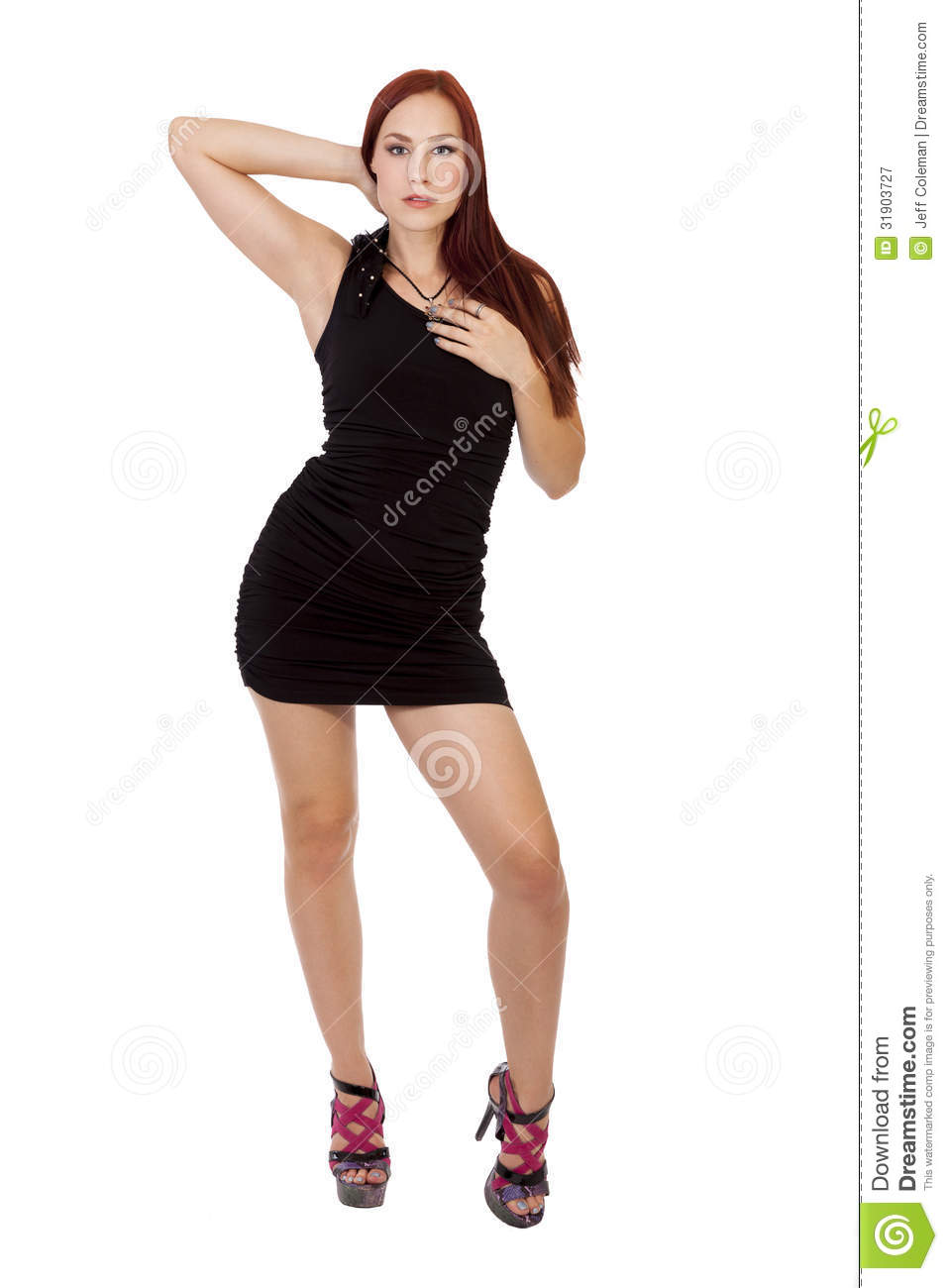 Beautiful Woman Long Shapely Legs Stands In A Black Dress  Royalty