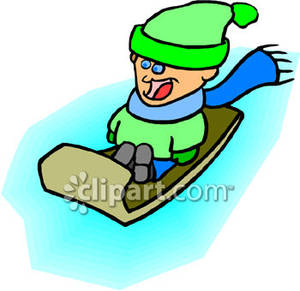 Child Riding In A Snow Sled Royalty Free Clipart Picture