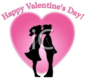Silhouette Of A Young Couple Kissing With A Pink Heart Shaped