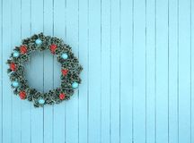 Green Wreath With Blue And Red Bow On Antique Teal Aqua Rustic Wood