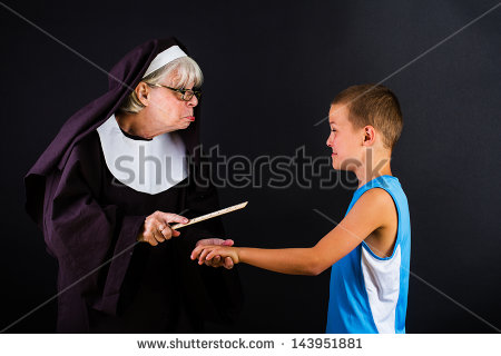 Nun Smacking A Boy On The Knuckles With A Ruler  Stock Photo