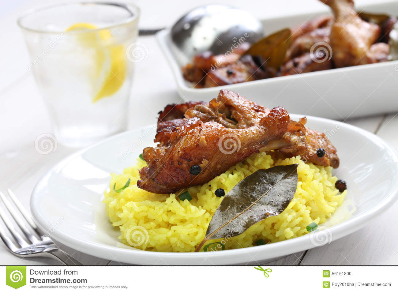 Chicken And Pork Adobo Over Yellow Rice Filipino Food