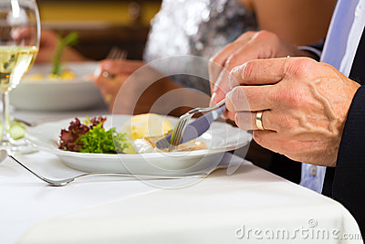 People Fine Dining In Elegant Restaurant Royalty Free Stock Photos