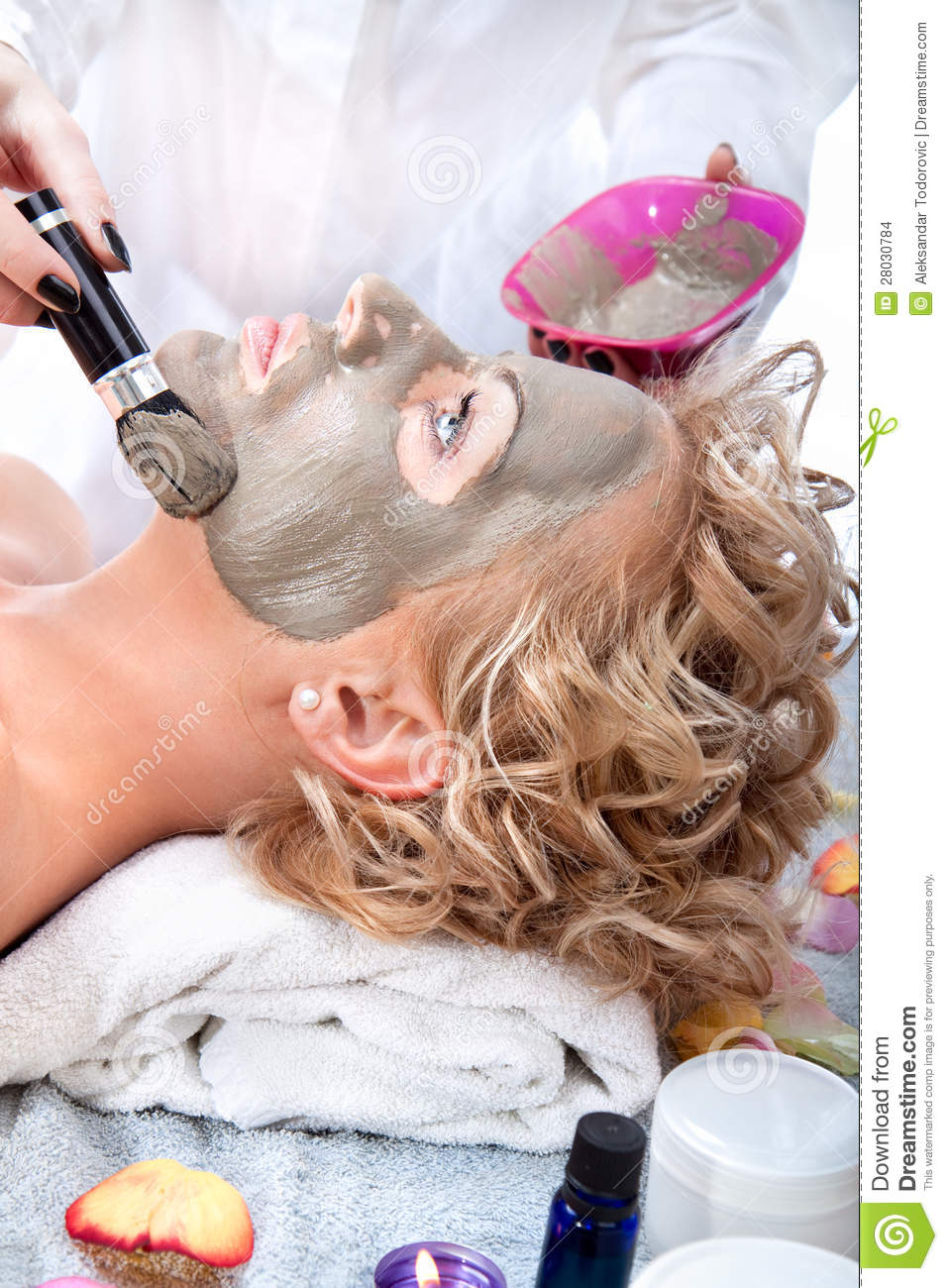 Applying Mud Face Pack On Woman Face Stock Images   Image  28030784