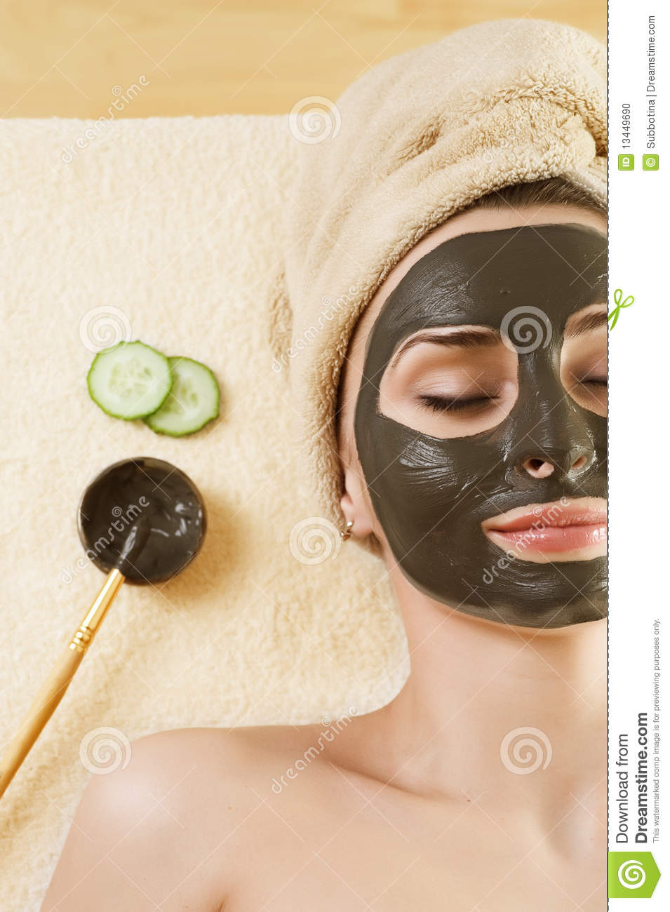 Beautiful Young Woman Applying A Mud Mask Spa And Facial Care Concept