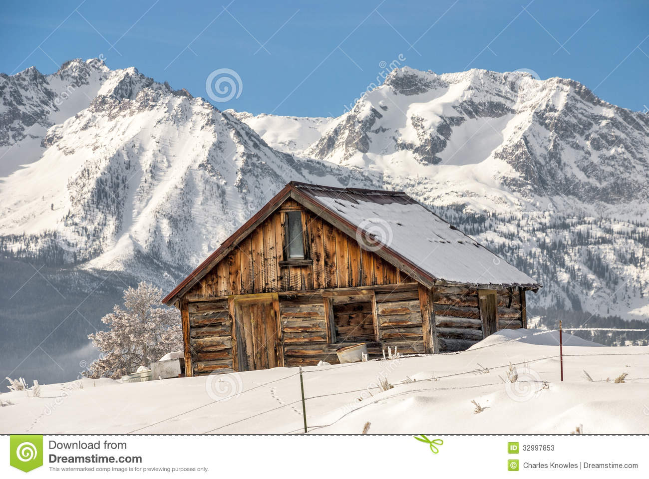 Winter Cabin And Idaho Mountains