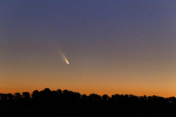 Comet Silhouette He Writes  Comet Pan Starrs