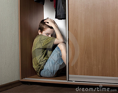 Sad Boy Hiding In The Closet Stock Photography   Image  18917492
