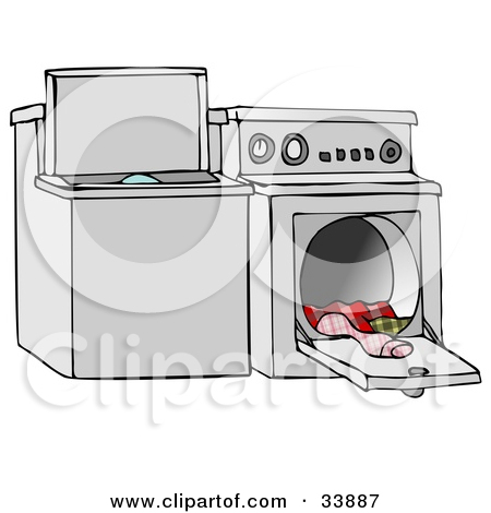 Top Loading Washing Machine And An Open Dryer With Warm Clothes