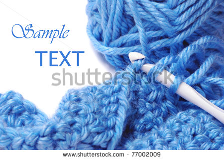 Blue Silky Yarn With Crochet Hook And Completed Stitches On White