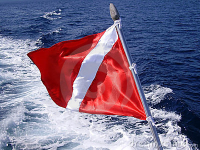 Scuba Diving Red And White Flag Flying Off The Back Of A Dive Boat