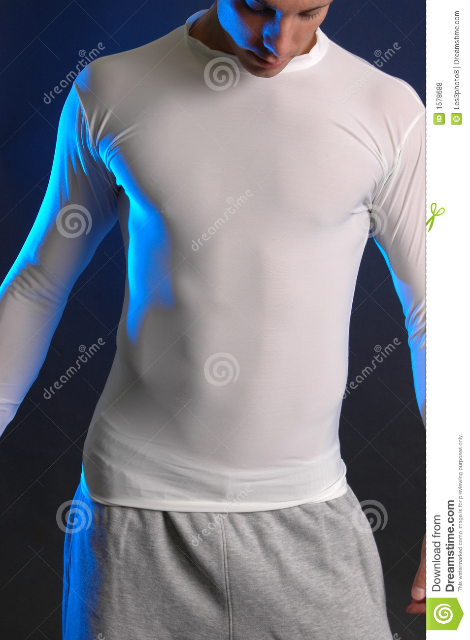 Male Model With Great Abs In A Tight White Shirt He S In Sweat Pants