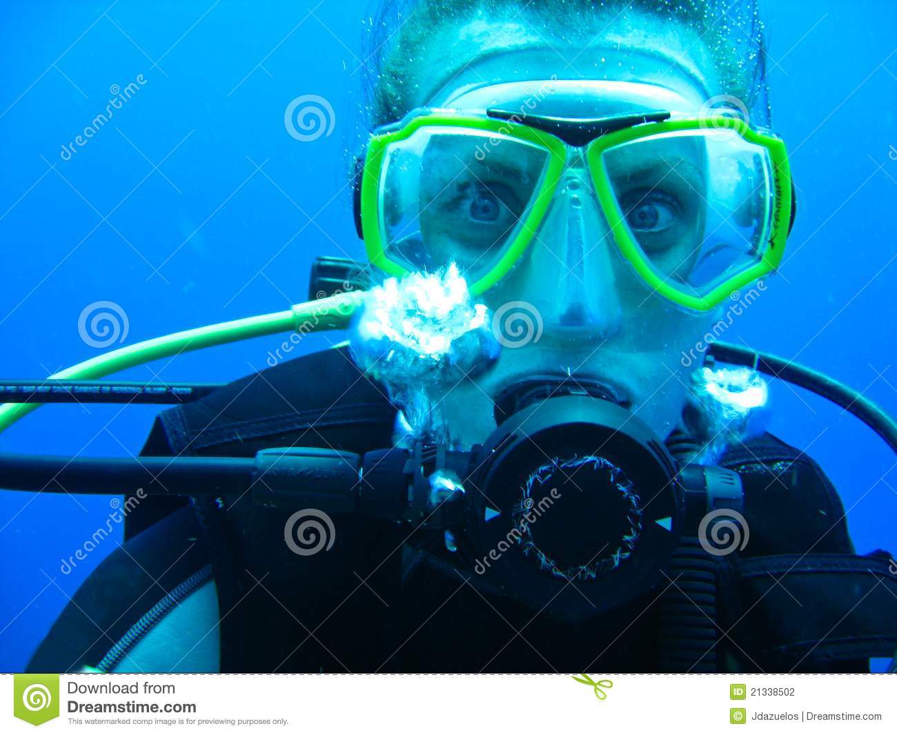 Female Scuba Diver Descending The Barbados Caribean Water To See